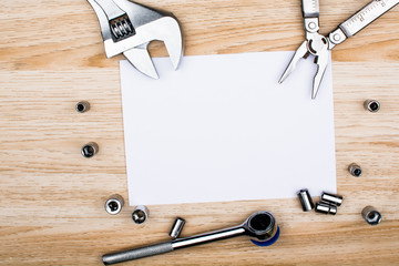 House making tools and empty sheet of paper. Studio shot on wooden background. Fathers day composition © HAFIZULLAH