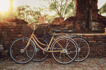Fototapeta na wymiar Tourist Bicycles at Wat Phra Si Sanphet temple in Ayutthaya Historical Park, a UNESCO world heritage site, Thailand