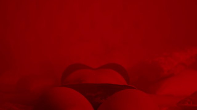 Sexy girl in lingerie falling on bed in slow motion. Sexual woman in lingerie fall on bed. Sensual girl in underwear falling on bed. Sexy woman relaxing at bedroom. Erotica concept