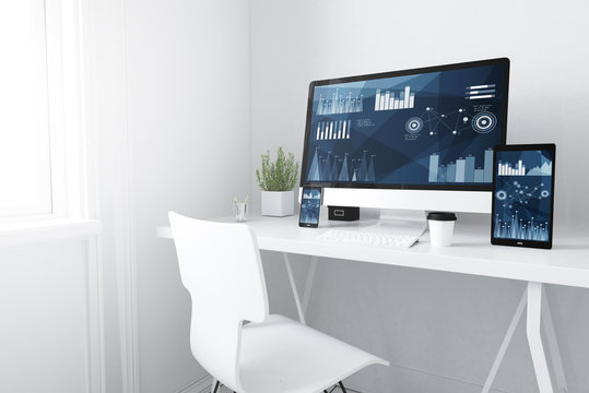  devices on white minimal workspace finances