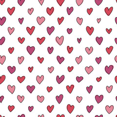 Seamless hand drawn hearts pattern in shades of red and pink. Perfect for background, fabrics, clothing, websites.