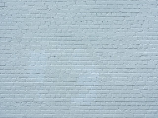Fototapeta na wymiar Hintergrund: Backsteinmauer, weiß gestrichen