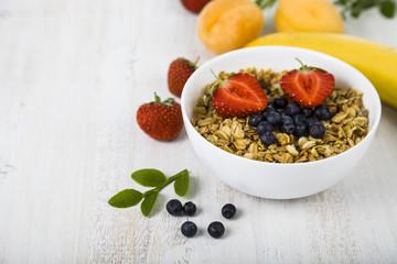 Granola with strawberry  and blueberries