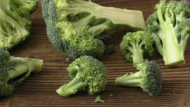 Fresh broccoli on the wooden table 
