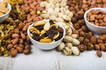 Nuts on a  wooden table.