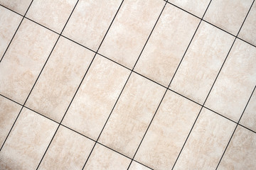 Light beige tile wall texture background