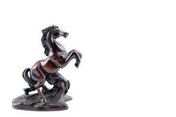 Beautiful sculpture of horse brown made of  wood isolated on the white background.