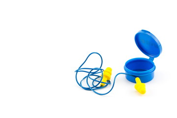 ear plugs yellow with cord isolated on white background