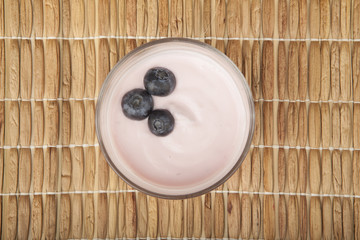 glass of fresh berries and yogurt