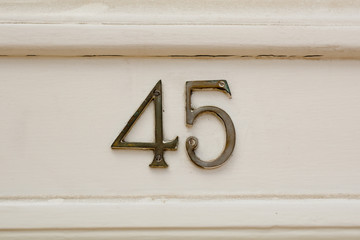 house number 45 sign on door
