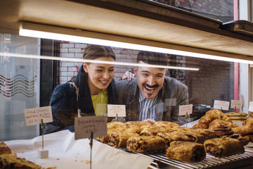 Happy Couple Choosing Breakfast