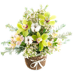 a bouquet of orchid flowers in a wicker basket