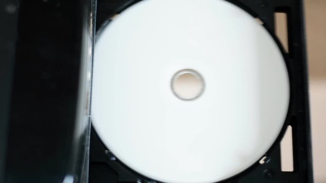 man press button to open and close dvd rom tray, top view