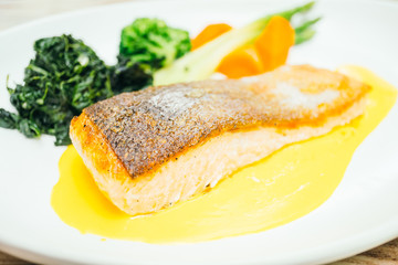 Salmon meat fillet steak in white plate