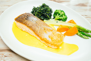 Salmon meat fillet steak in white plate