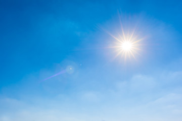Sunny background, wonderful blue sky with bright sun