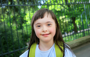 Down syndrome girl in the park