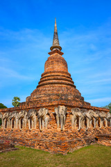 Obraz premium Wat Sorasak Temple at Sukhothai Historical Park, a UNESCO World Heritage Site in Thailand
