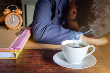 coffee cup clock and work on table