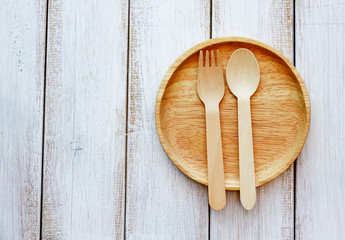 Stock Photo - set of wooden cutlery on old wooden table