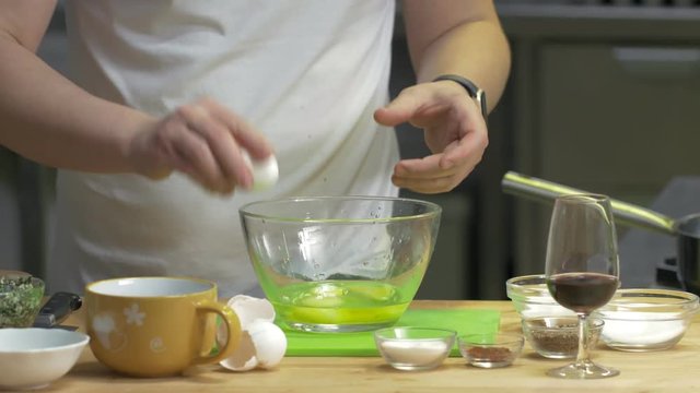 Chef man cooking healhy omlette in a restaurant kitchen