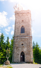 Old stone lookout tower Zaly in Giant Mountains, Krkonose, Czech Republic.