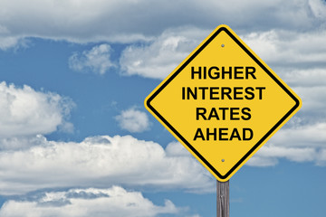 Caution Sign Blue Sky - Higher Interest Rates