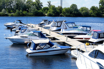 Docked boat. Boat mooring in the river port