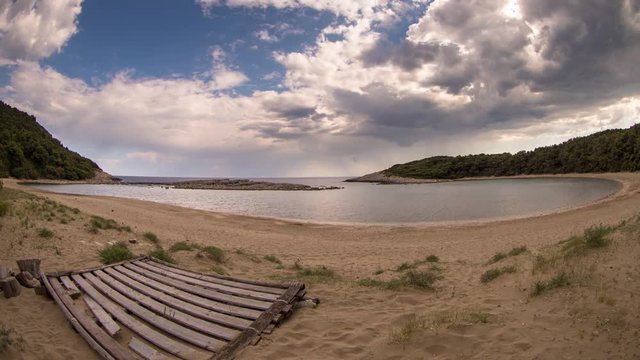timelapse of a wooden shack on beautiful limoni beach in mljet island, croatia with stunning crystal clear water of the adriatic sea.
