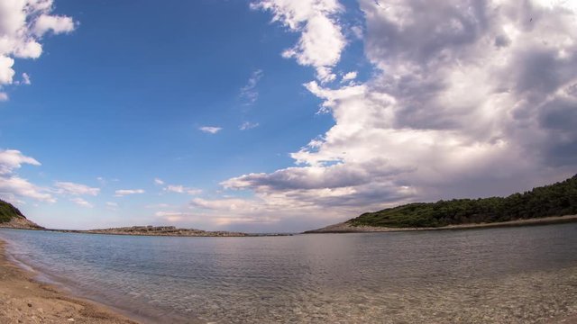 timelapse of a wooden shack on beautiful limoni beach in mljet island, croatia with stunning crystal clear water of the adriatic sea.