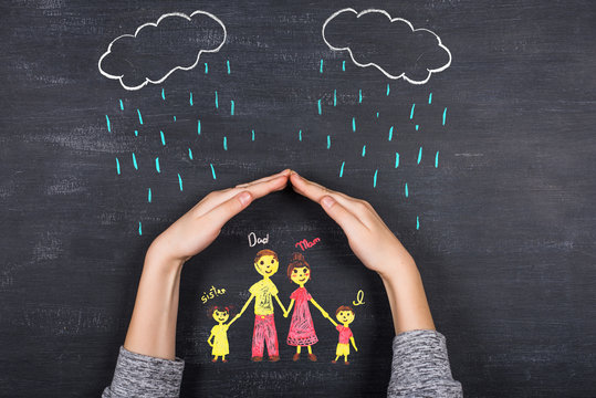 Hands Protects Family From The Elements - Rain Or Storm