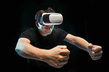 Fototapeta na wymiar The man with glasses of virtual reality. Future technology concept.