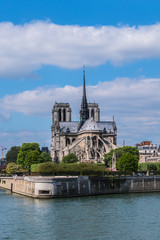 Fototapeta na wymiar View of Cathedral Notre Dame de Paris - a most famous Gothic, Roman Catholic cathedral (1163 - 1345) on the eastern half of the Cite Island.