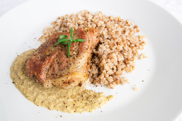 pork steak with buckwheat porridge and onion sauce