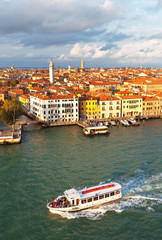 Obraz premium Venice. Top view of the Dorsoduro district and San Basilio water bus stop from above in the rays of the setting sun