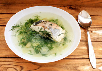 Fish Dorado, sea bass cooking fish soup