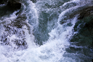 Naklejka na ściany i meble Waterfall in the river Switzerland