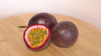 Passion fruit on wooden background.