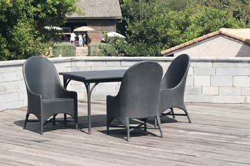 Fototapeta premium Wooden chairs in the garden vintage style.
