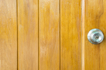 Fototapeta premium door knob wood backgrond , basic wood door