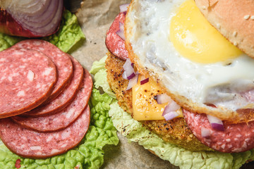 Hamburger with vegetables and egg