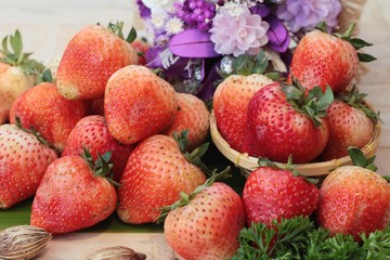 fresh strawberries is delicious on wood background