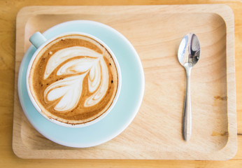 coffee heart cup on wood table in coffe shop cafe