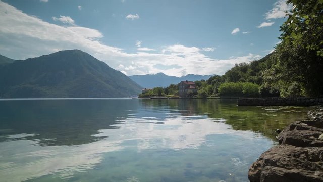 timelapse of the beautiful bay of kotor in montenegro where mountains reach crystal clear waters