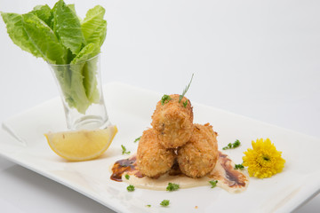 Banana fried on white dish