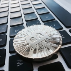 Gold bitcoin on keyboard