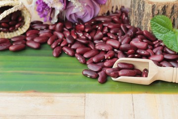 Red bean for health on wood background