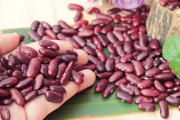 Red bean for health on wood background