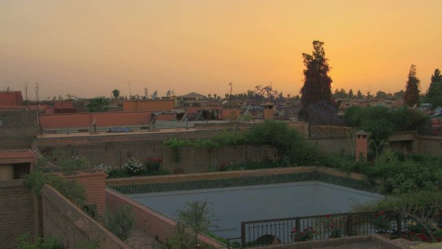 Amazing sunset time lapse above African city Marrakesh in Moroco