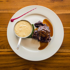 Meat with smashed potatoes gourmet cuisine